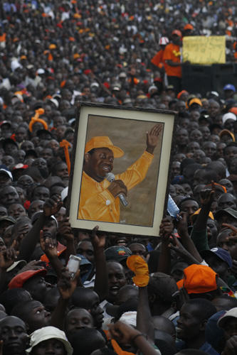 Raila Odinga Supporters marching. Kenyan politics are set for another clash between Raila and Uhuru Kenyatta